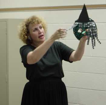 Susan demonstrats a 'Witch' puppet